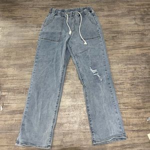 Medium in size (8-10) pull on baggy fit jeans